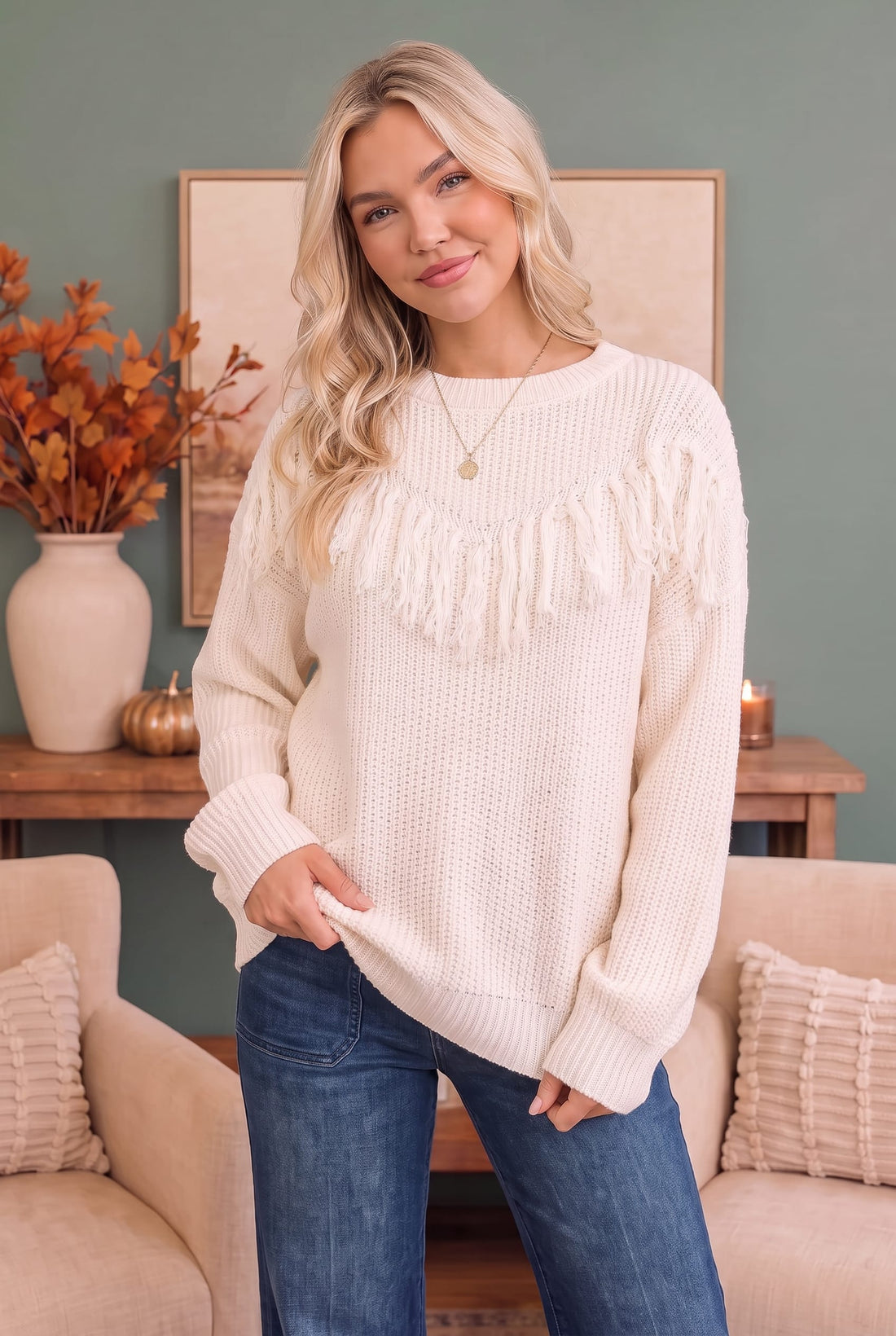 Cozy cream fringe knit sweater for a Thanksgiving outfit