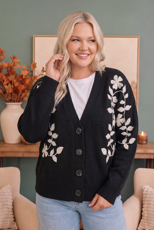 Black knit cardigan with cream floral embroidery, photo 1 of 4