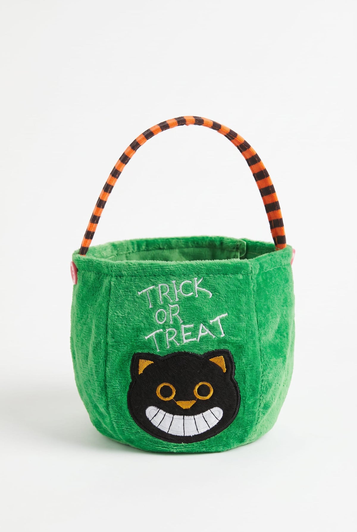 Green plush Halloween mini tote with black embroidered face