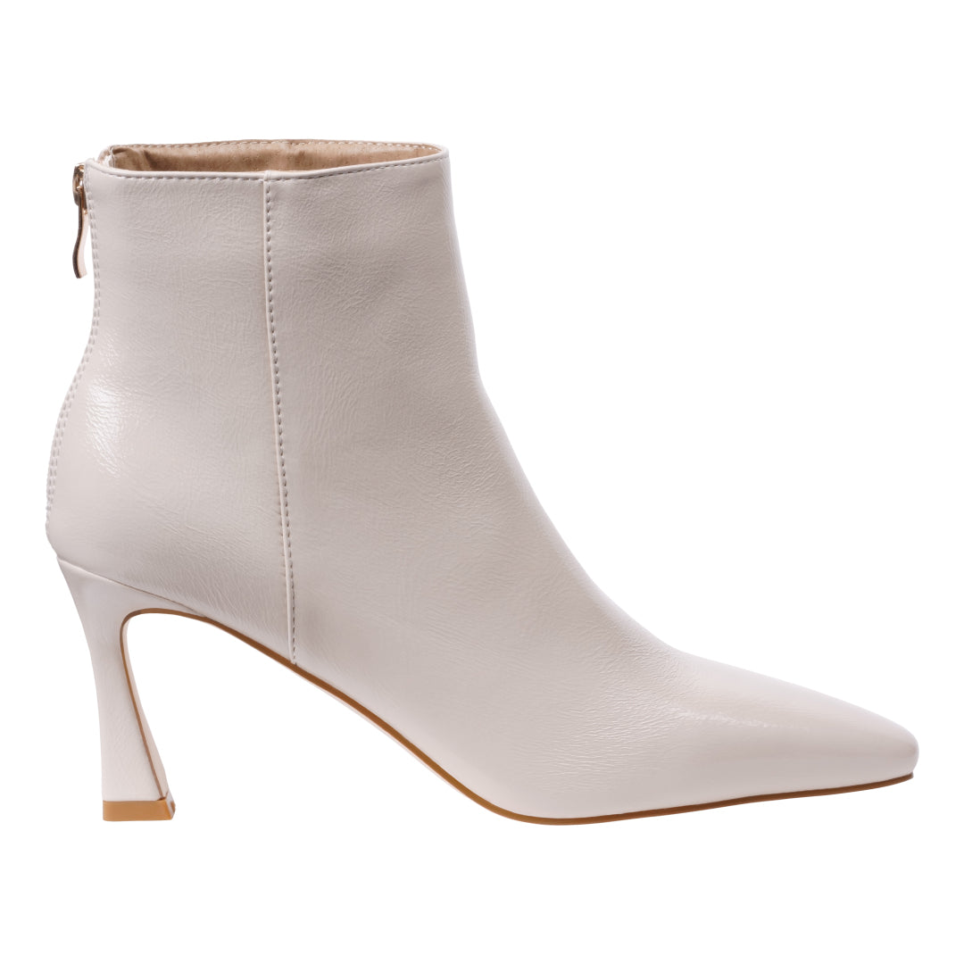 Glossy off white pointed toe bootie with flared heel, photo 2 of 5