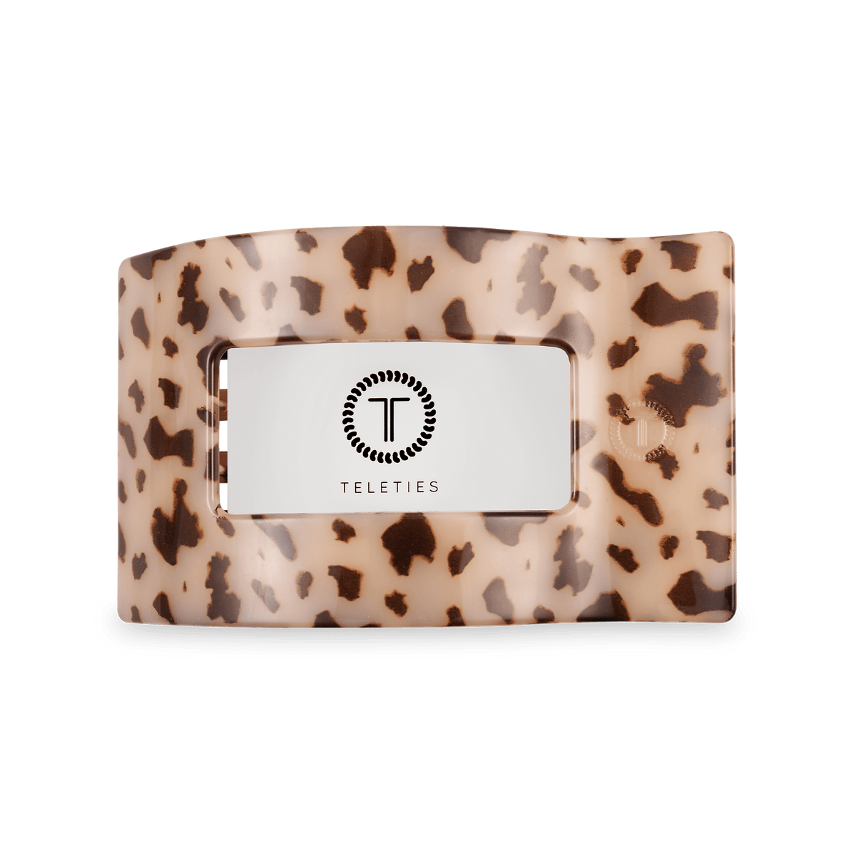 Leopard print cardholder with a brand label on a green background