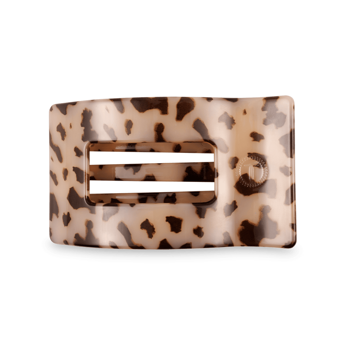 A rectangular hair claw clip with a glossy tortoiseshell pattern in beige and brown, featuring a central cutout with two horizontal white bars and a small circular brand logo on the right side.