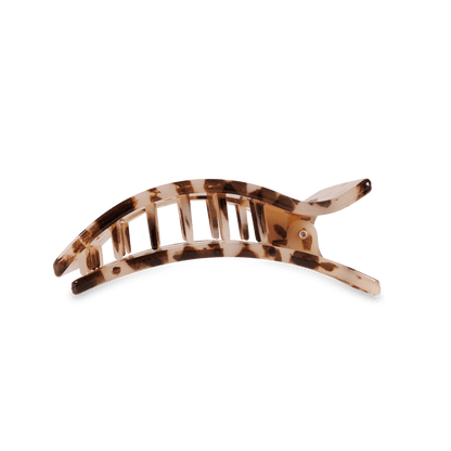 Tortoiseshell patterned hair clip on a transparent background